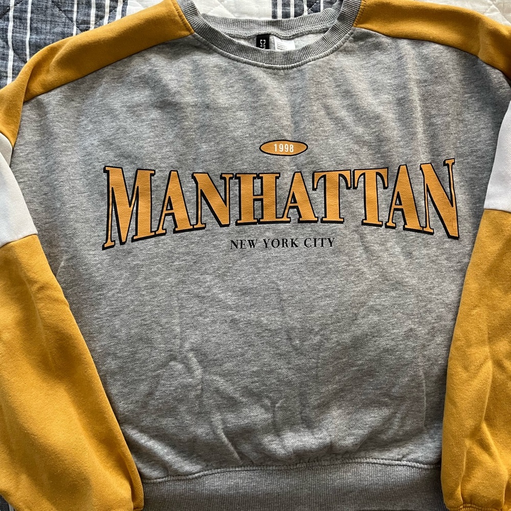Divided (H&M) “Manhattan” crew neck.